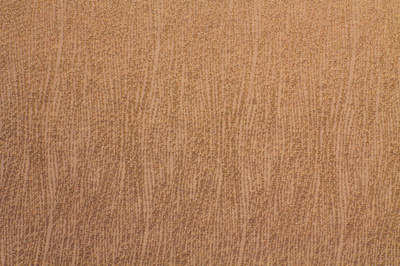 披著波浪的藍(lán)綠色羊毛織物與合成纖維織物的對比與融合